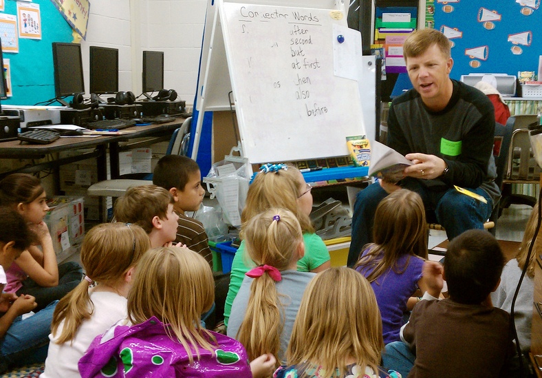 My hubby, reading to my daughter's class last year